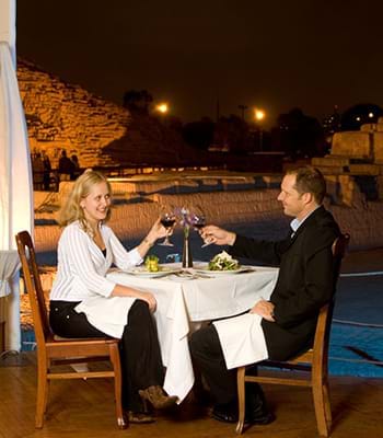 Tourists tasting typical dishes at the Huaca Pucllana