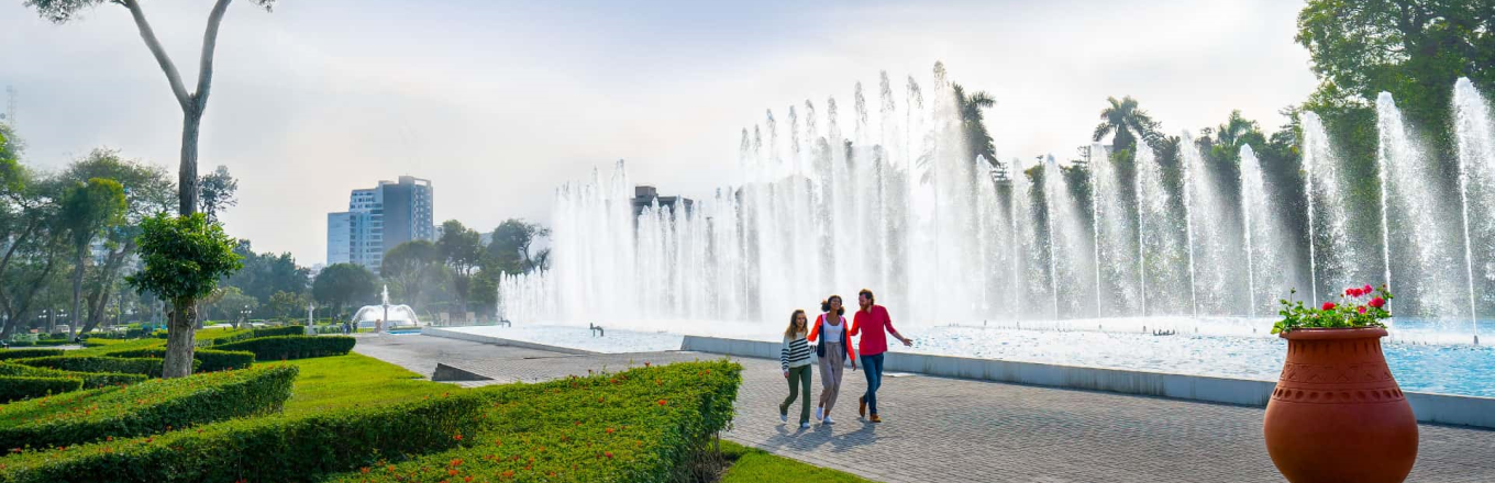 Tourists strolling along the Magical Water Circuit