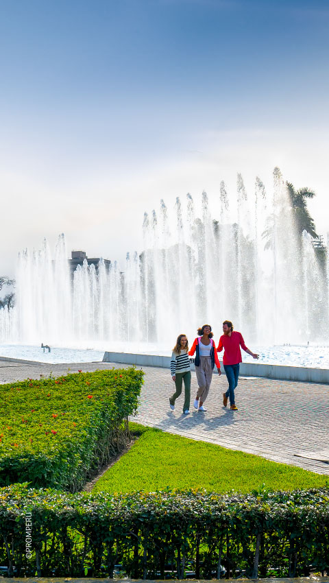 Tourists strolling along the Magical Water Circuit