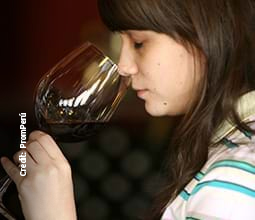 Tourist tasting red wine at the Vista Alegre land
