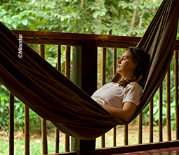 Tourist relaxing at the Posada Amazonas.