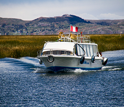 Boat cruising the waters of Lake Titicaca
