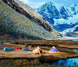 Tourists camping near the Ancash mountains