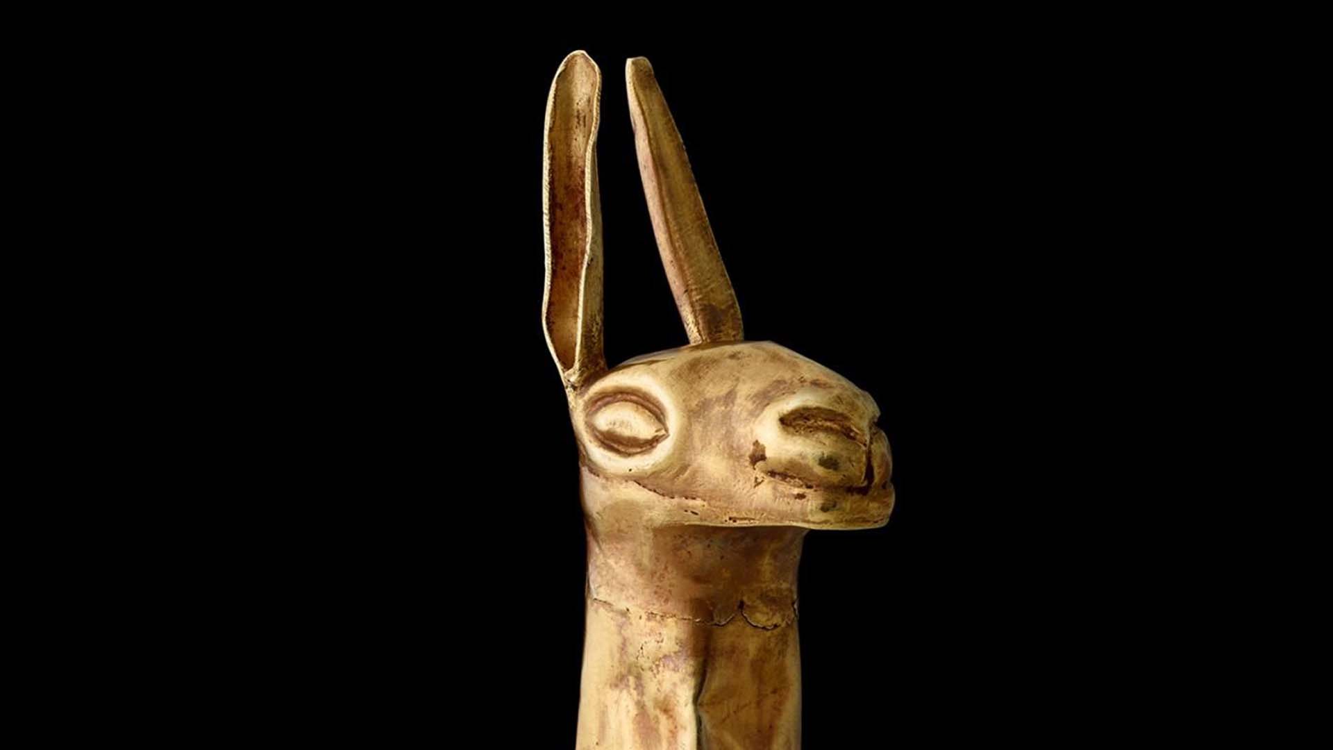 Miniature gold figure of a llama