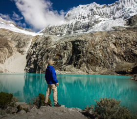  Backpacking tourist overlooking 69 Lagoon, Huaraz /
