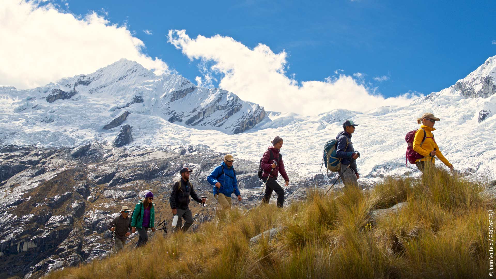 Group of people trekking in the Cordillera Blanca, Huascarán National Park.