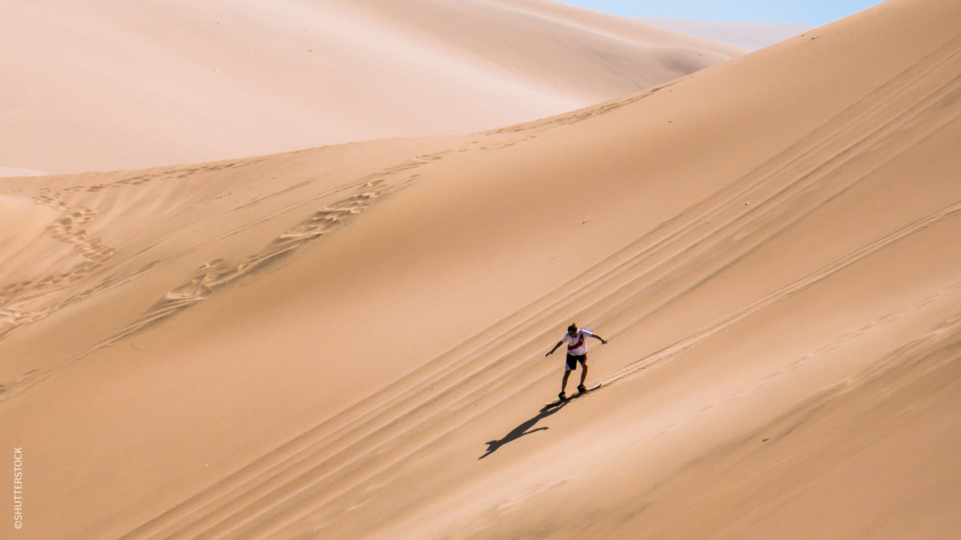 Pratique du sandboard dans le désert de Huacachina, Ica / ©SHUTTERSTOCK